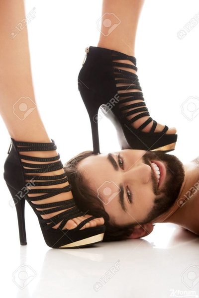 54159960-sexy-woman-s-foot-in-high-heel-on-man-s-face-dominating-him-.jpg